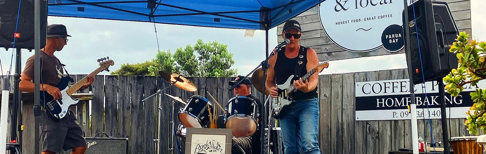 Smith-and-Local-Events-Hero-Image a local rock band is playing an event in front of Smith and Local